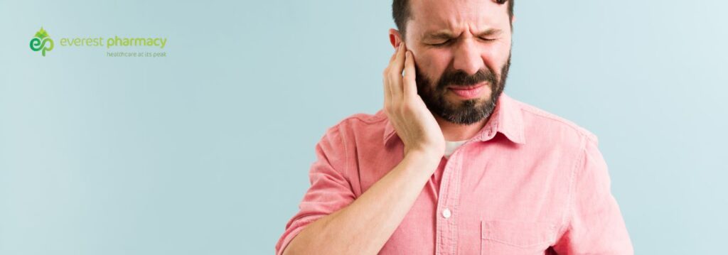 Man suffering with tinnitus