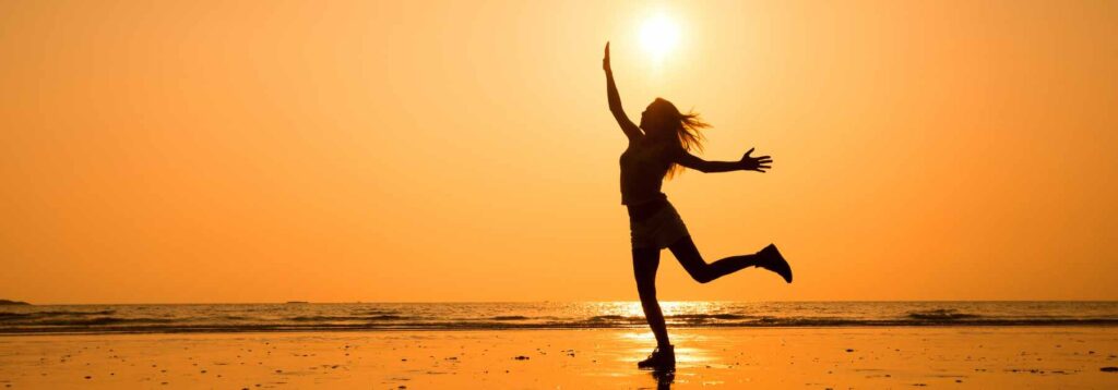 Happy woman on the beach