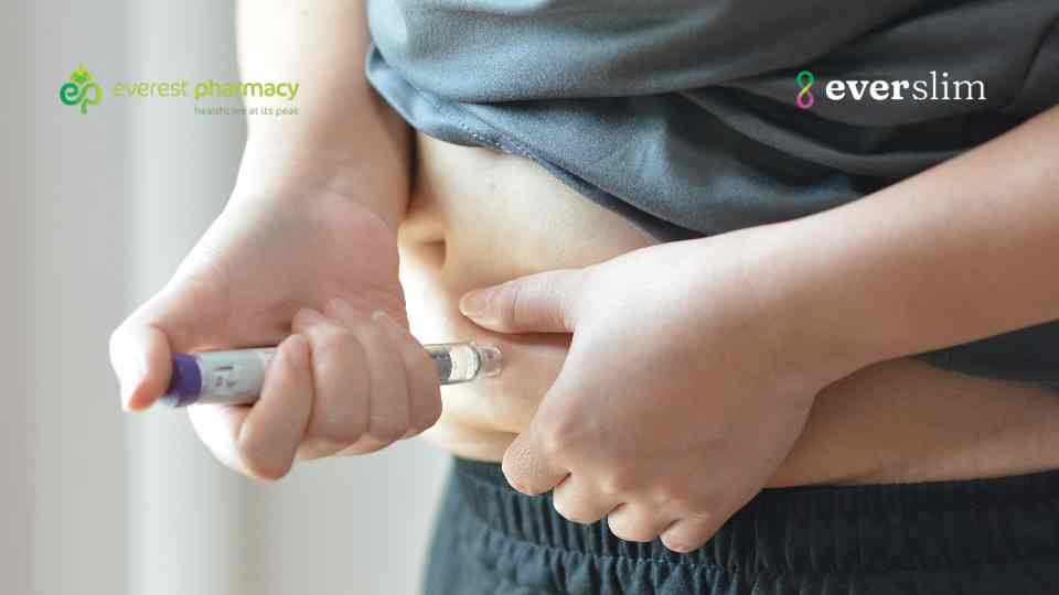 Man injecting weight loss medication into stomach
